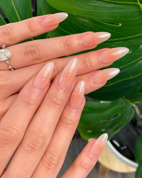 Glazed white and peach aura nails
