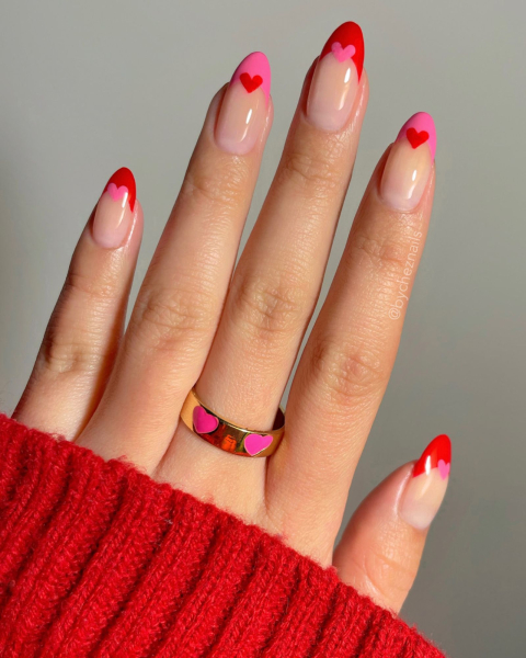 Pink and red French tip nails with mini heart nail art