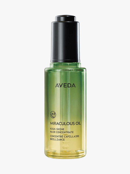 Aveda Miraculous Oil in branded component on a light gray background